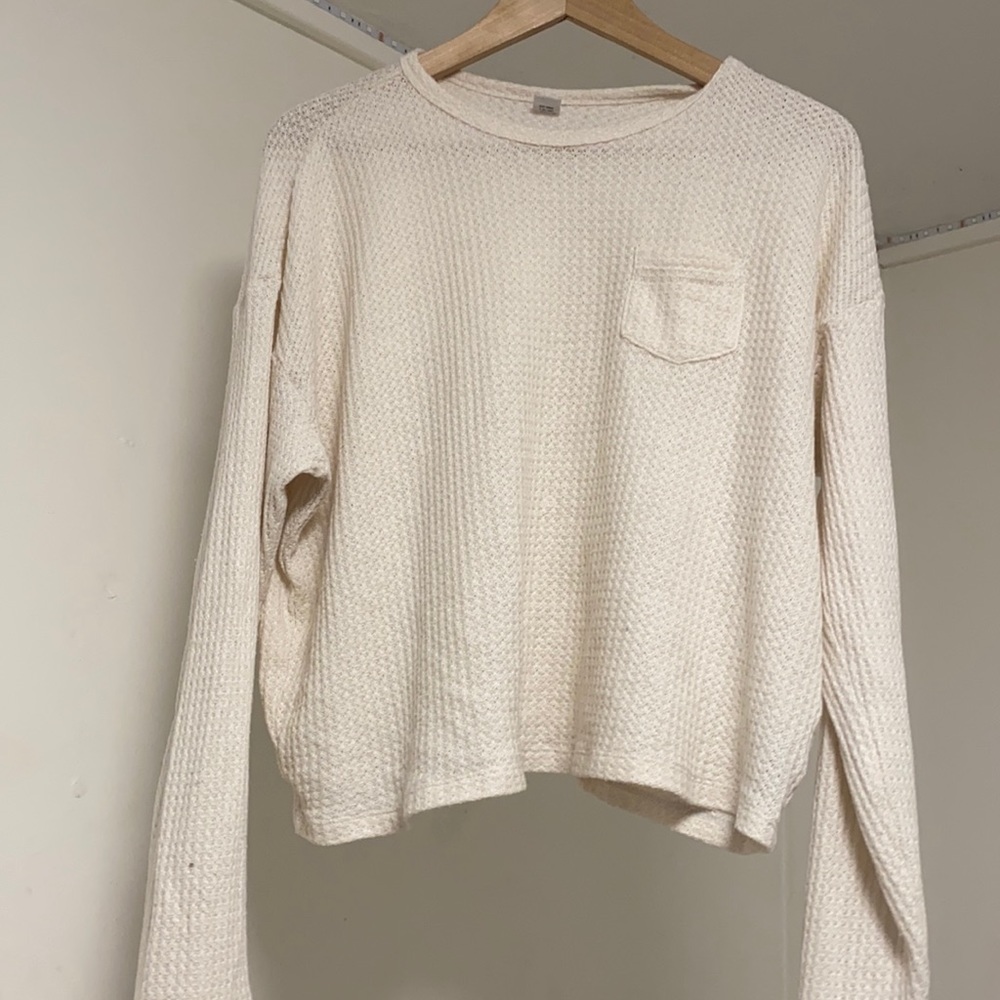 White/cream colored sweater